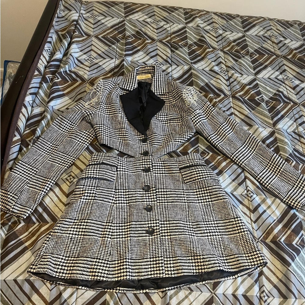 Plaid blazer cut out dress with crystals on shoulders. Never worn.